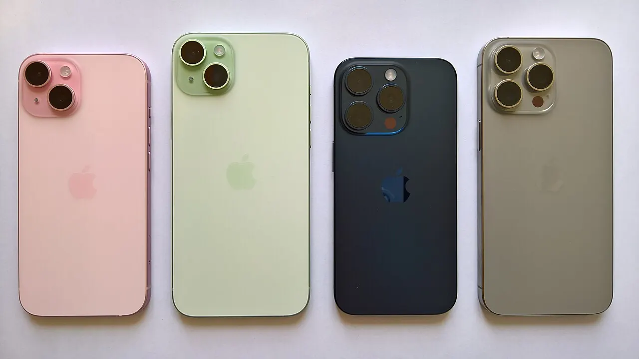 Four smartphones laid out showing their rear cameras