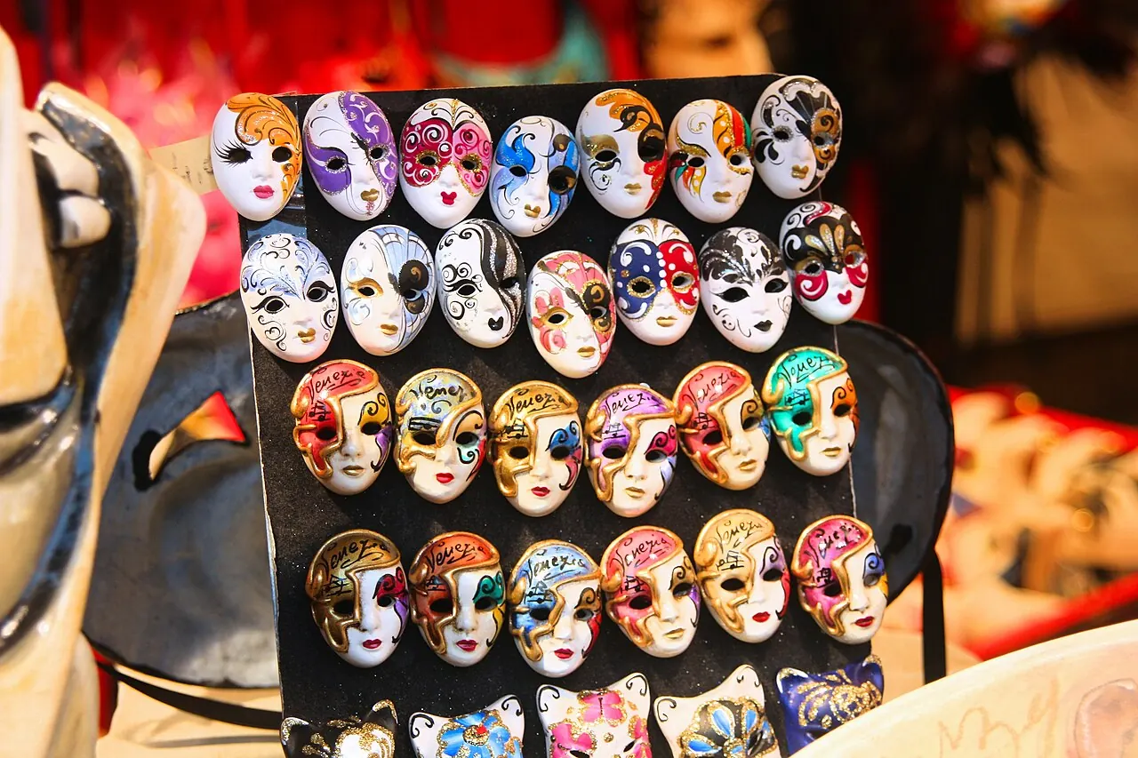 A wall of Venetian carnival masks