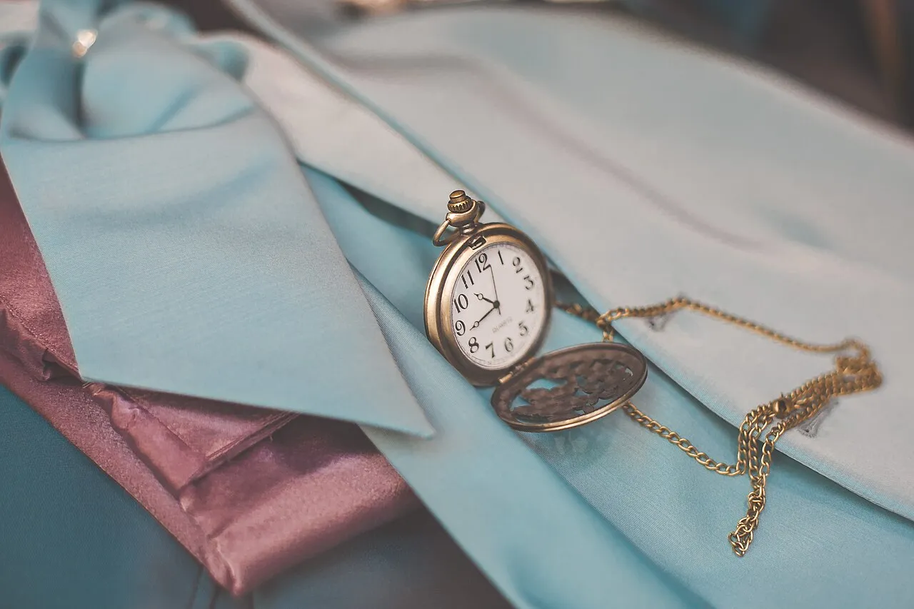 Pocket watch on a silk tie