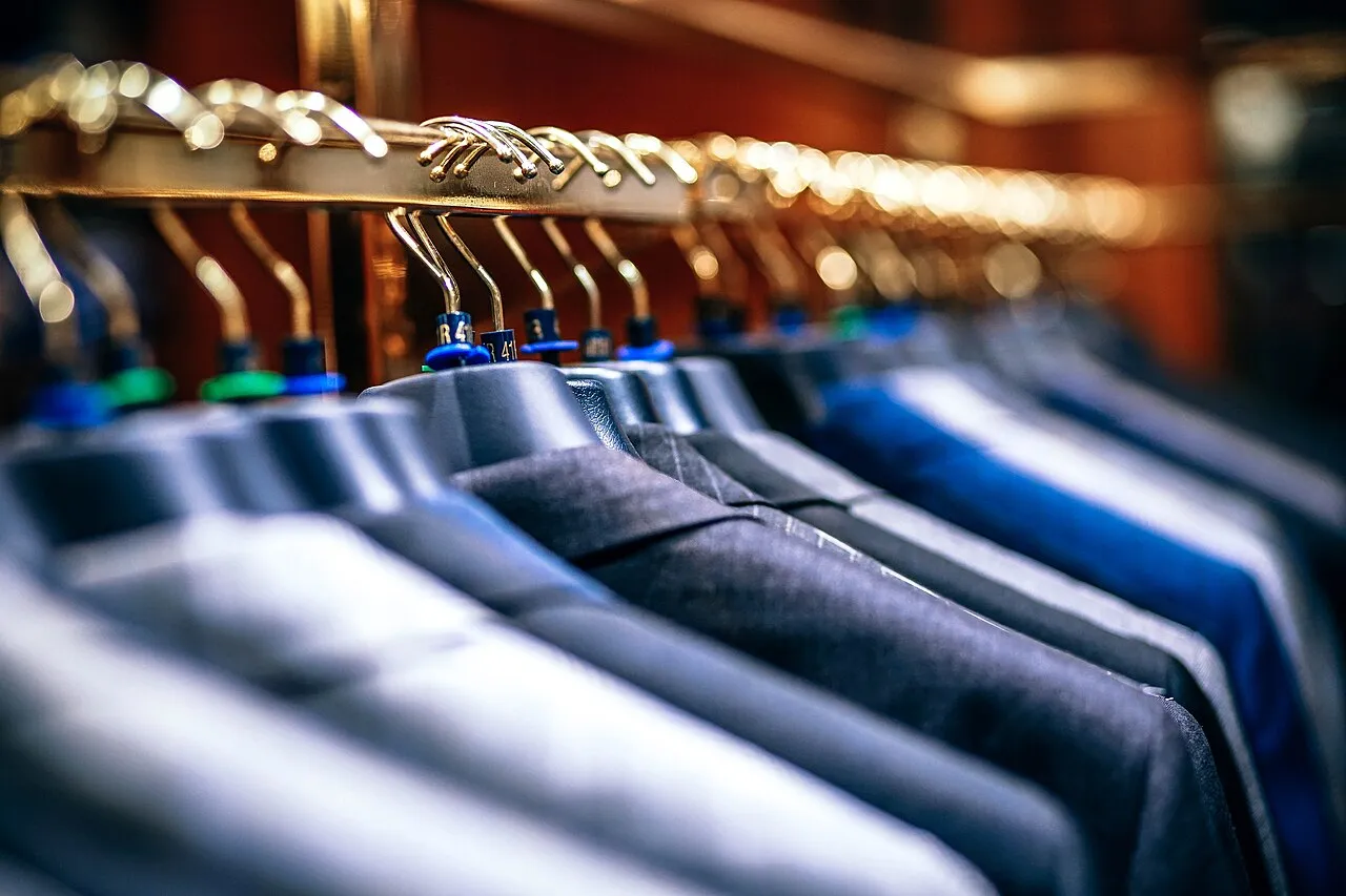 Row of jackets and blazers on hangers