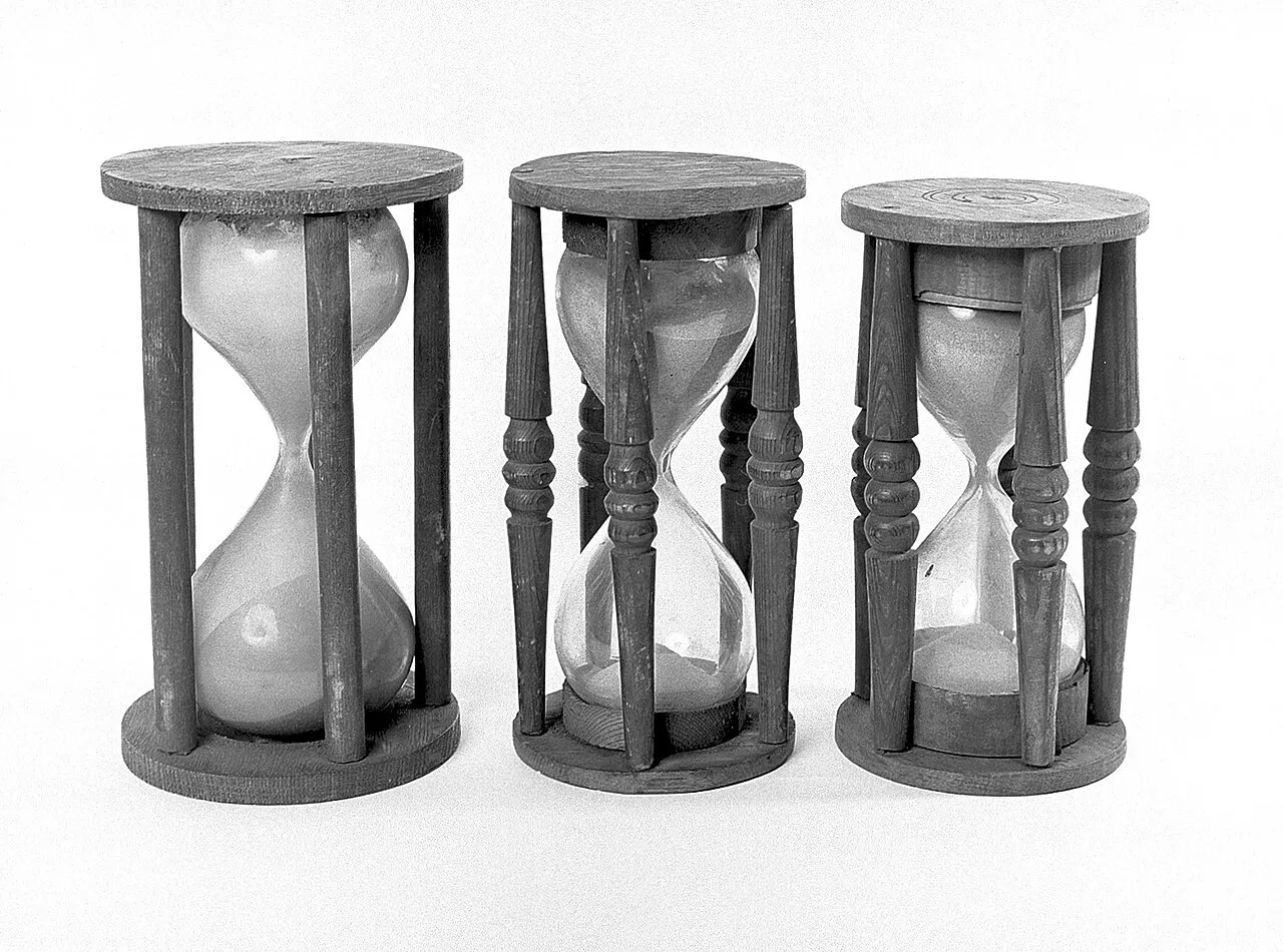 Three antique hourglasses