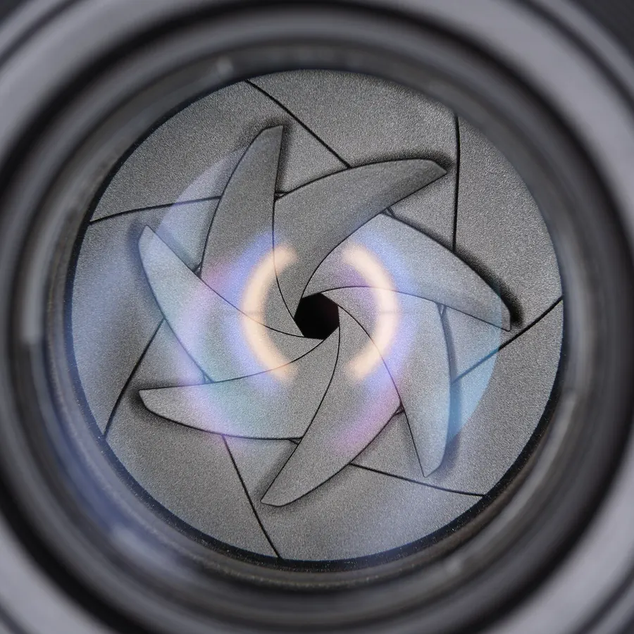 Camera lens aperture blades seen close up