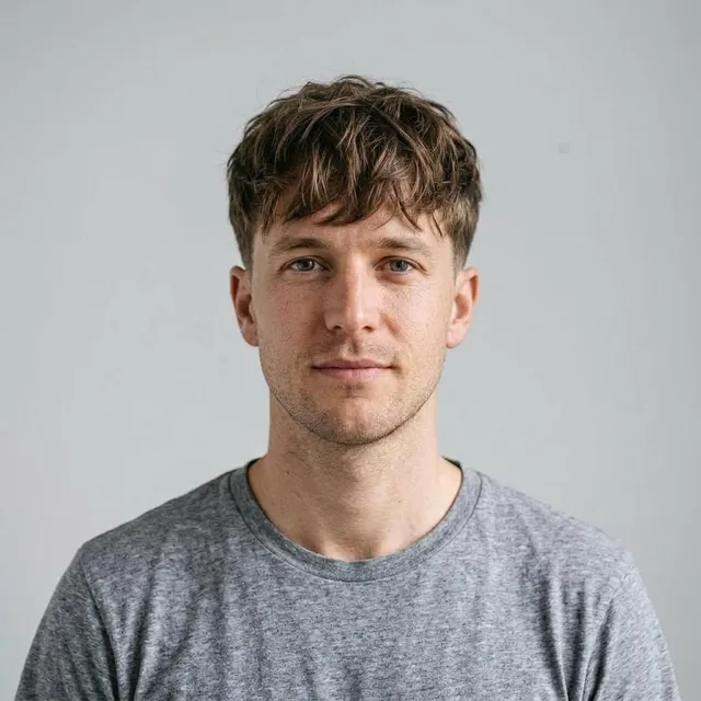 The same man after the AI try-on: textured fringe with mid taper