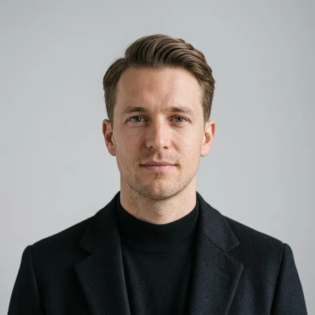 The same man after the AI try-on: side part and a wool coat